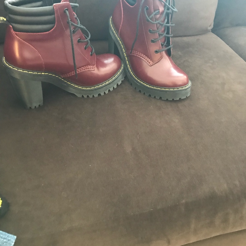 Doctor Martens boots wine color.